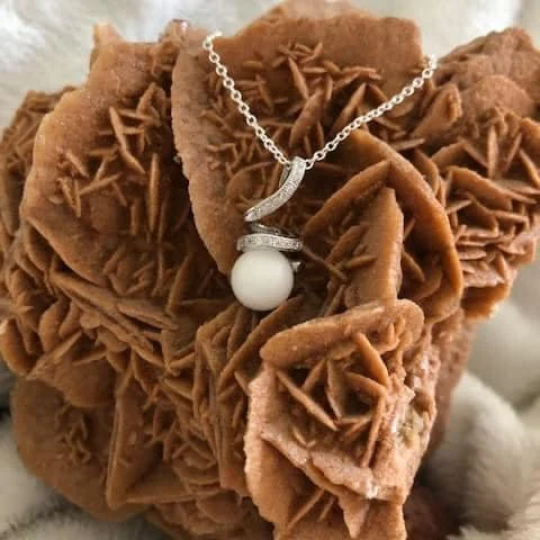 Pendentif stylisé argent