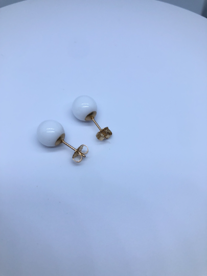 Clous d’oreilles perle de lait